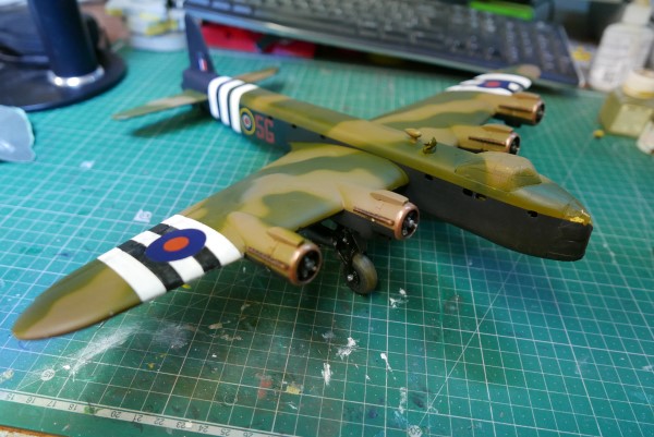 The stripes are hand painted, much as they were added on the real thing in 1944. For this reason I decided that rough edges and slight show-through in places would be acceptable. The cowls are hand painted copper and exhausts in bronze and dry brushed with black. The area where the decals sit was firstly &quot;gloss varnished&quot; with Quick Shine Floor Finish and when dry they were floated on using Humbrol Decalfix and pressed into position with a sheet of kitchen towel. When everything was dry the whole model was brushed over with Satin Cote and left to dry.